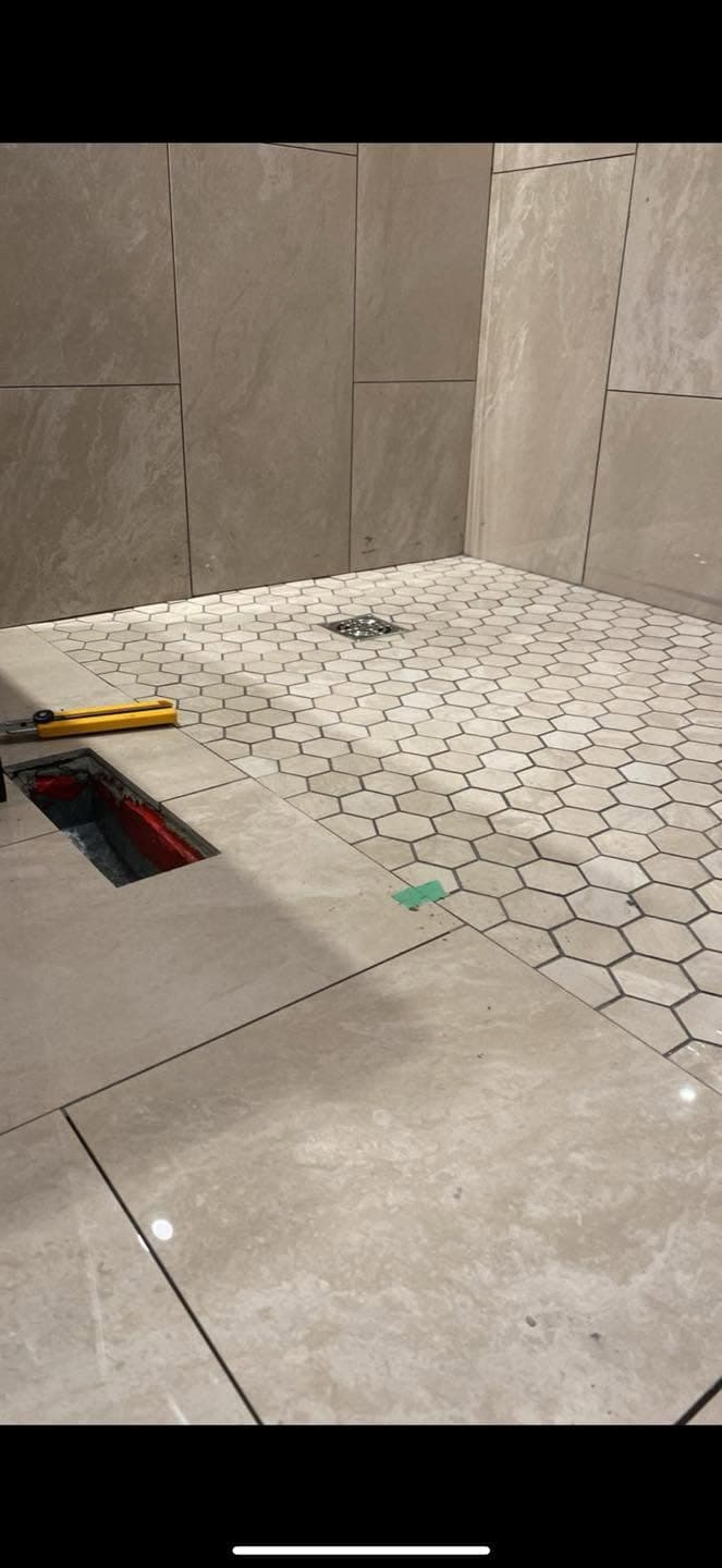 Hexagon mosaic tile shower floor detail